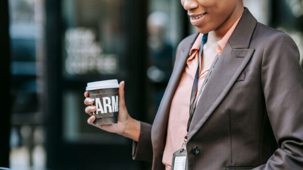 Smiling black businesswoman using a laptop for her small business